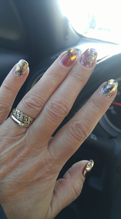 a hand with polished nails